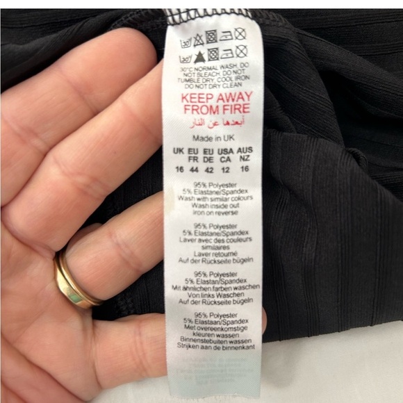 Pretty Little Thing black romper/jumper.
Spaghetti straps size 12 - Picture 4 of 7